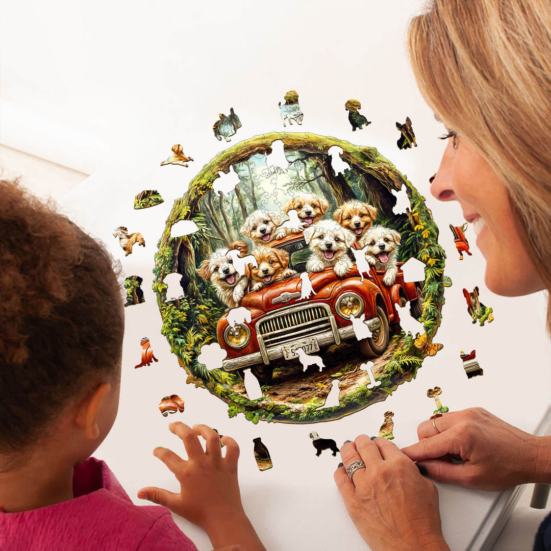 A child and adult working on a dog-themed jigsaw puzzle featuring fluffy puppies in a vintage car surrounded by nature.