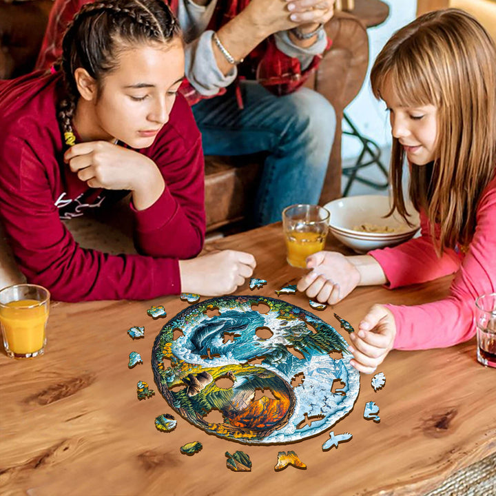 Two girls solving a Yin yang glacial forest wooden jigsaw puzzle on a table, enhancing focus and puzzle skills.