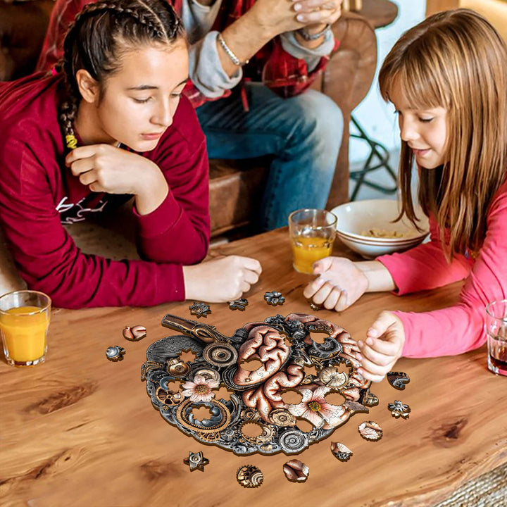 Two children engaged in solving a 3D Mechanical Brainstem wooden jigsaw puzzle on a wooden table.