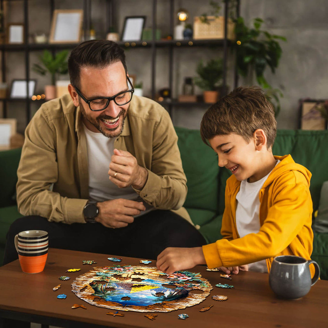 Father and son enjoying the Oasis Mirage wooden jigsaw puzzle together, fostering focus and creativity.