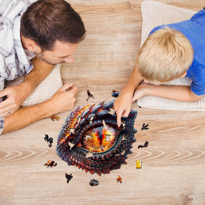 Father and son enjoying the 3D Blaze Eye wooden jigsaw puzzle together, enhancing focus and problem-solving skills.