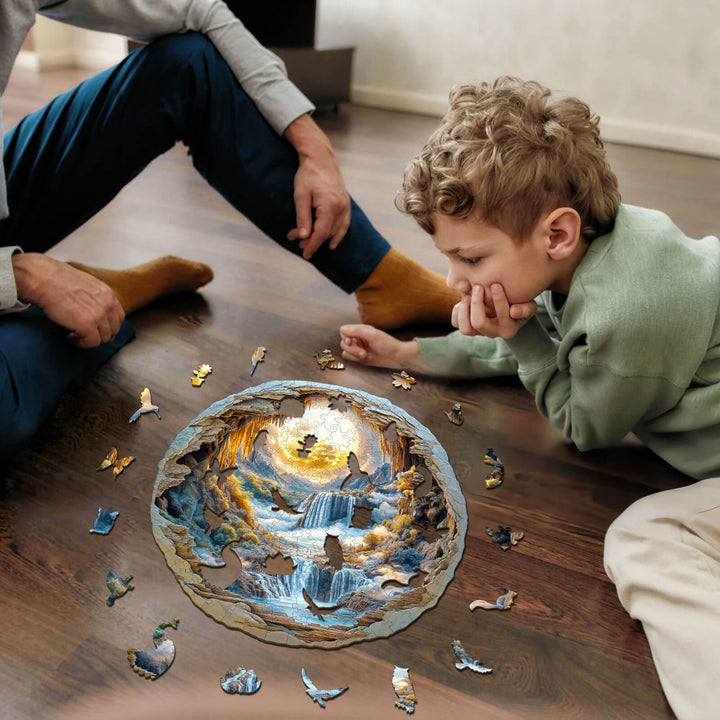Child and adult assembling a 3D Moonlit Wonders wooden jigsaw puzzle on a floor, immersed in puzzle-solving.