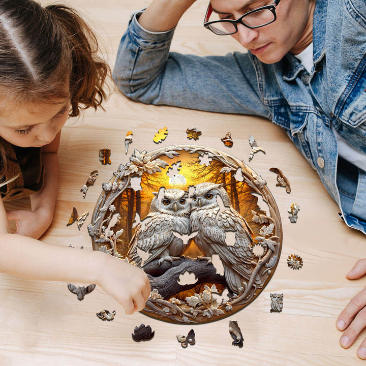 A child and adult assembling a 3D Owl-3 wooden jigsaw puzzle, enhancing focus and cognitive skills together.