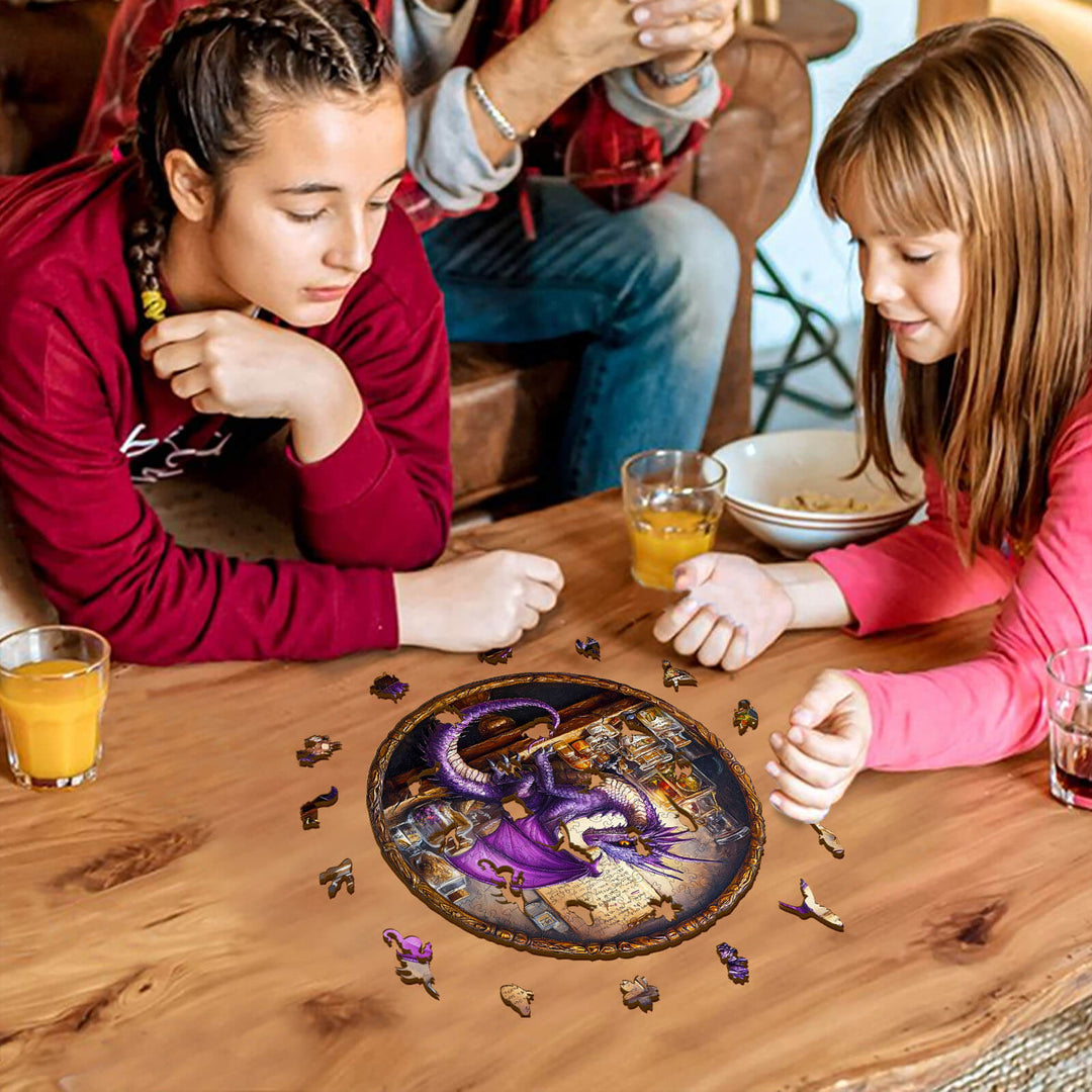 Two children assembling the Magic Dragon Wooden Jigsaw Puzzle featuring a majestic purple dragon in a cozy setting.