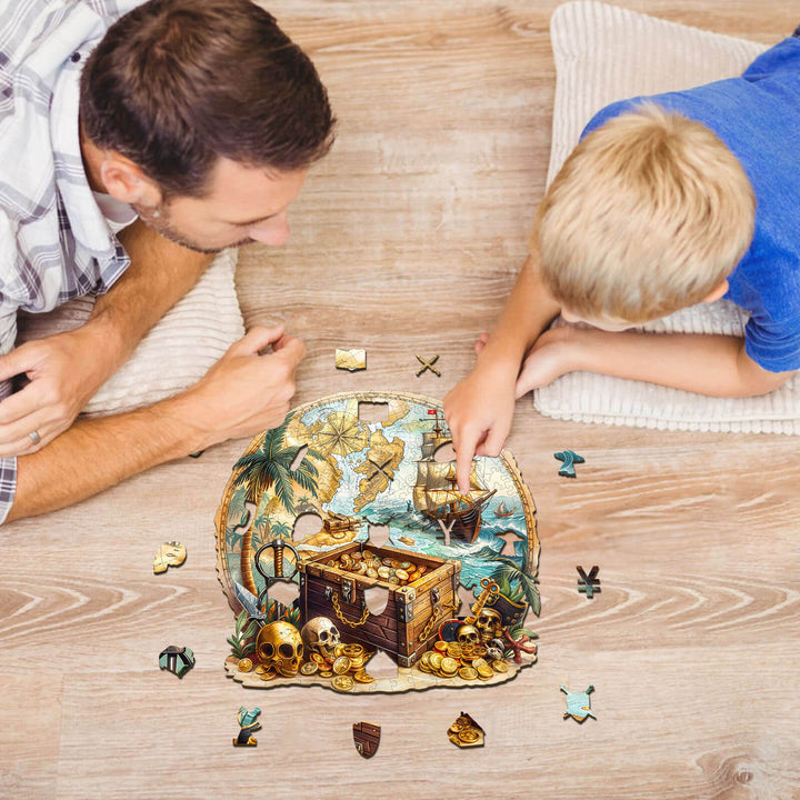 Father and son working together on the Golden Voyage wooden jigsaw puzzle featuring a treasure map and pirate theme.