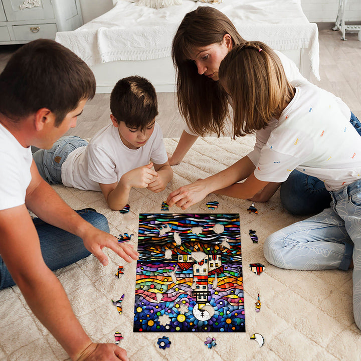 Family enjoying quality time together while assembling a puzzle featuring the Glassy Lighthouse by artist Pietro Gallo.