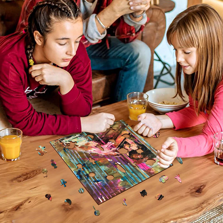 Two girls working on a colorful puzzle together at a wooden table, enjoying a fun art activity.