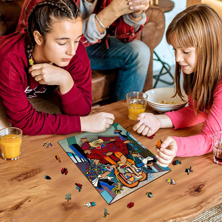 Two girls assembling a vibrant puzzle inspired by modern art, with drinks on a wooden table in a cozy setting.
