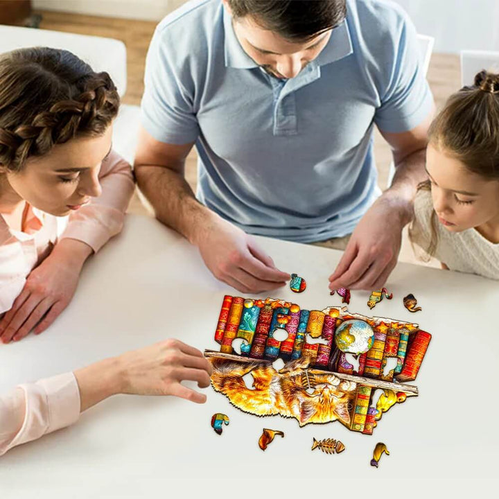 Family enjoying a Dreamy Tabby Cat wooden jigsaw puzzle together at a table.
