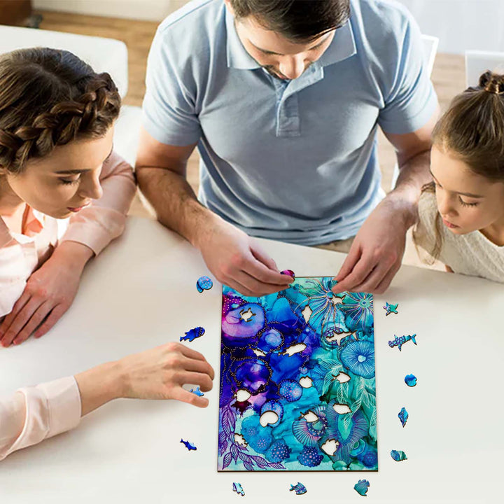 Family enjoying a colorful puzzle featuring floral art by Amy Tieman, capturing creativity and bonding moments.