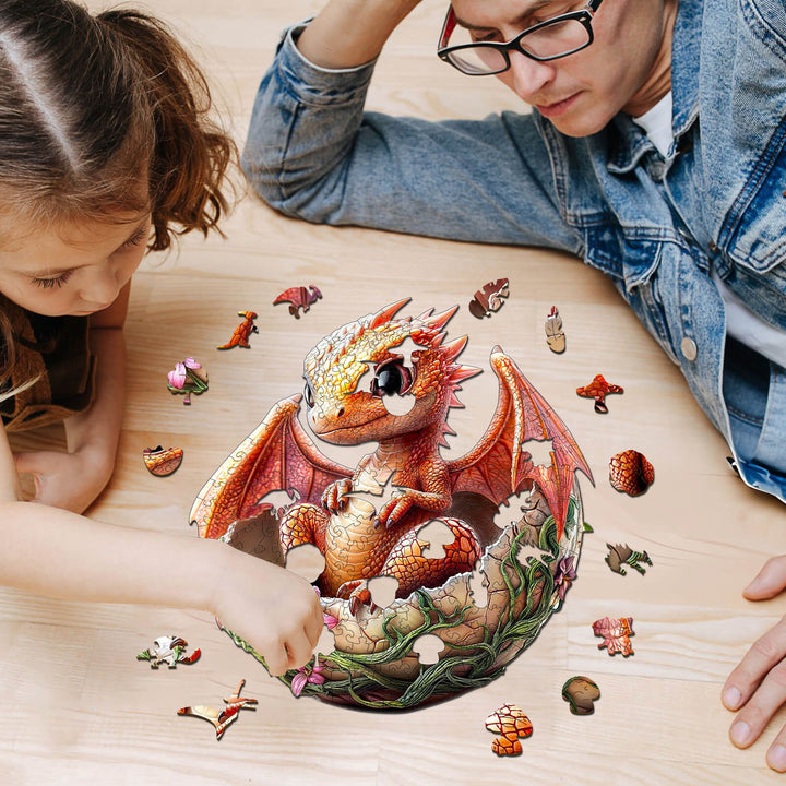 A child and adult solving a whimsical dragonet wooden jigsaw puzzle on a wooden table, enhancing focus and fun.