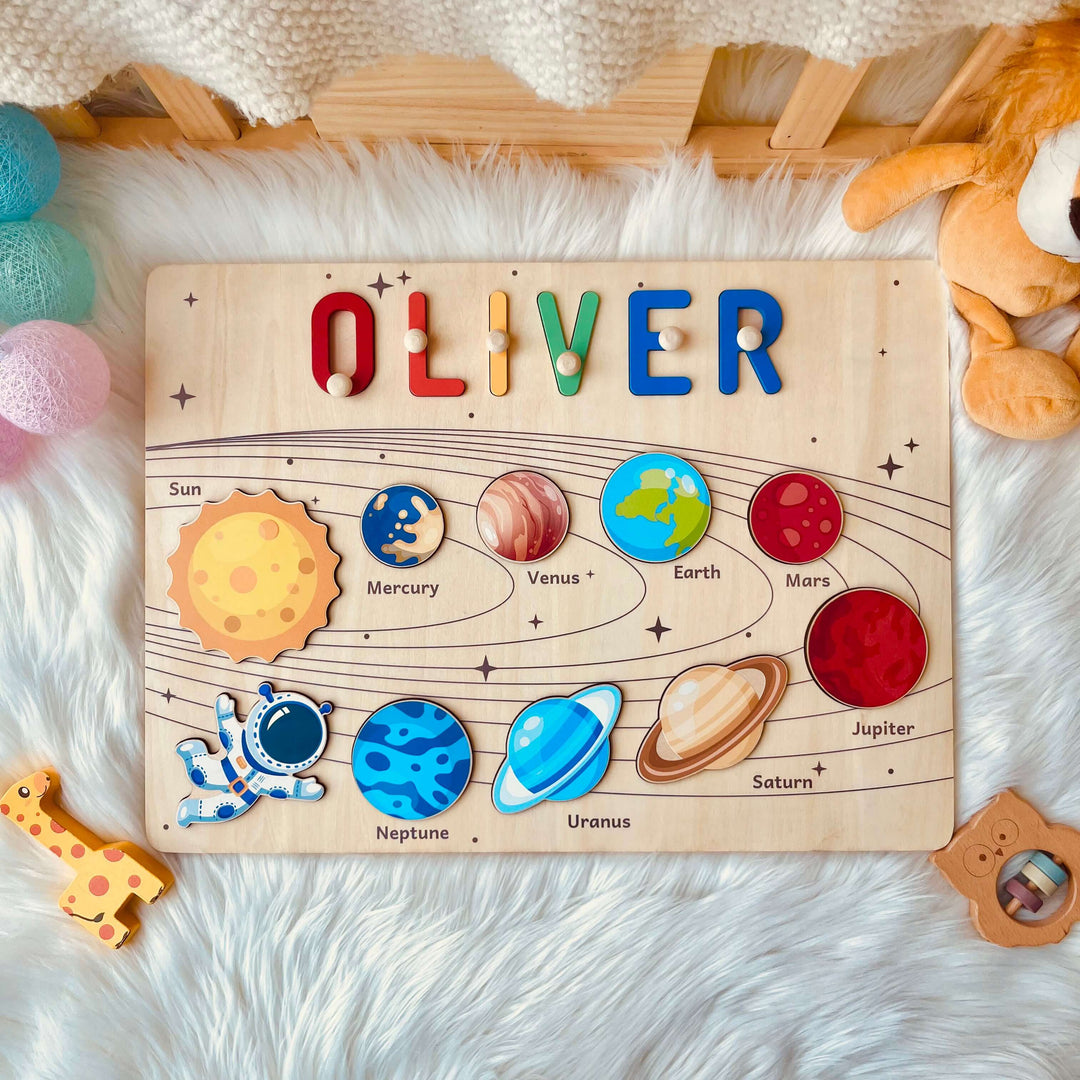 Personalized Planet Name Puzzle featuring colorful planets and child's name 'OLIVER' for educational play.