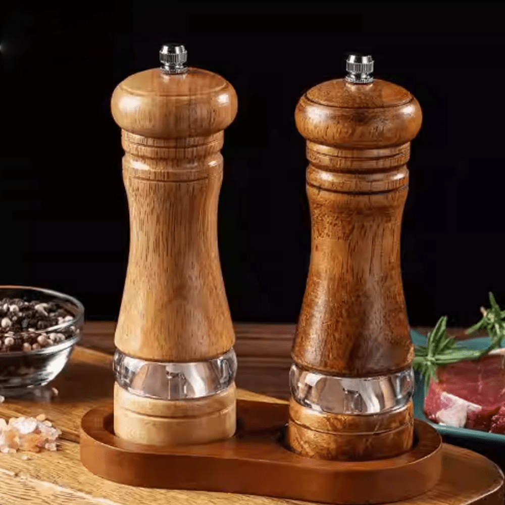 Two-tone spice grinder set made of natural rubberwood, stylishly enhancing your dining experience.