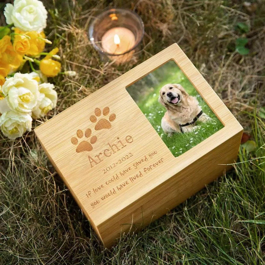 Personalized wooden pet urn with photo and engraved message honoring a beloved dog named Archie.