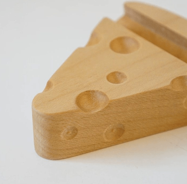 Wooden cheese-shaped bottle opener crafted from natural maple wood, featuring details and a fun design for kitchen use.