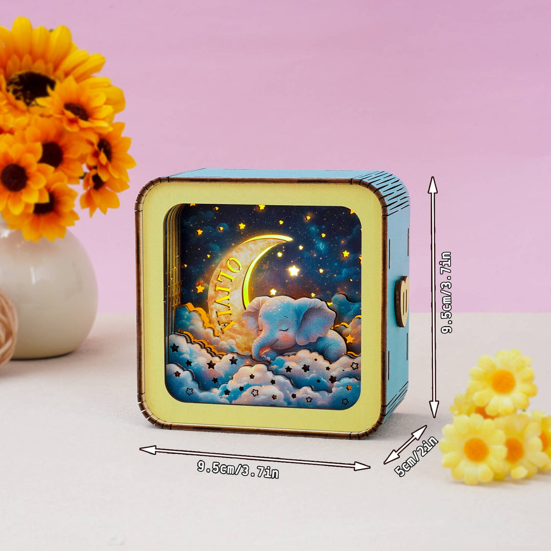 Dream Elephant 3D wooden puzzle night light kit showcasing an elephant under the moon, perfect for personalized home decor.