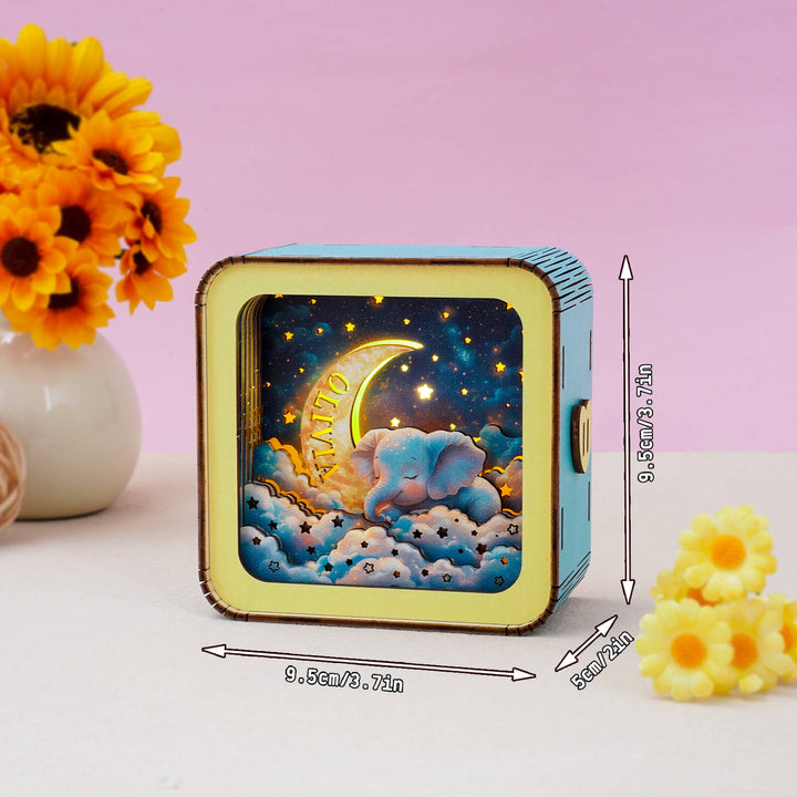 Dream Elephant 3D wooden puzzle night light kit showcasing an elephant under the moon, perfect for personalized home decor.