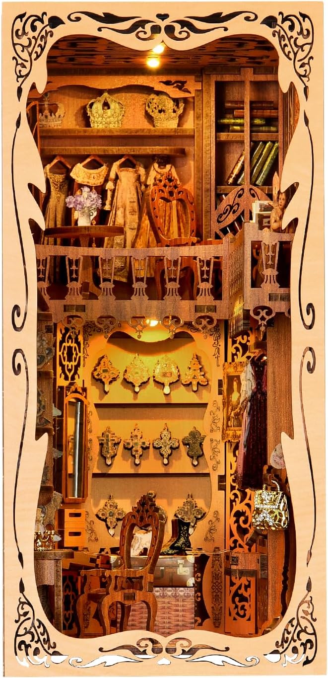 3D wooden book nook kit of a European noblewoman's wardrobe featuring elegant clothing and ornate decor.