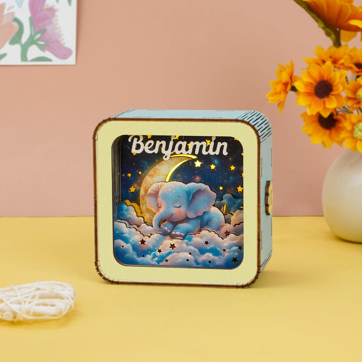 Personalized 3D wooden puzzle night light featuring an elephant design with the name 'Benjamin', perfect for home decor.