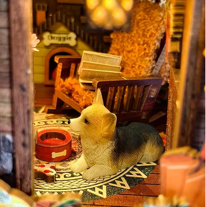 Cute corgi in a cozy DIY book nook with a rocking chair and pet accessories, creating a warm autumn atmosphere.