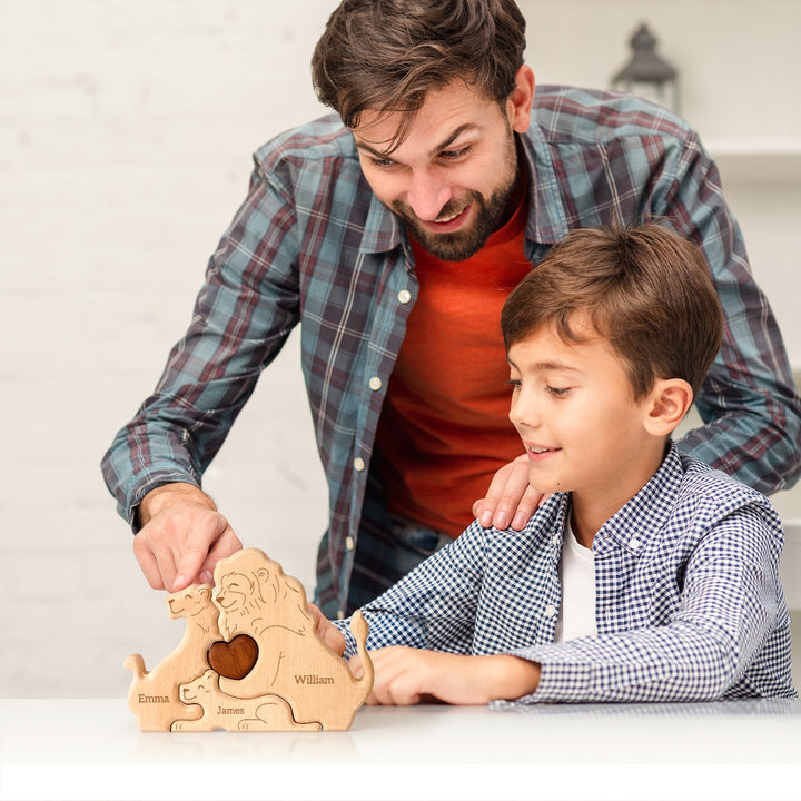 Father and son enjoying a personalized wooden lion family name puzzle together.
