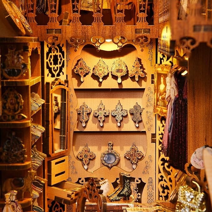 Duchess Wardrobe book nook kit featuring intricate wooden accessories and a stunning display of aristocratic fashion.