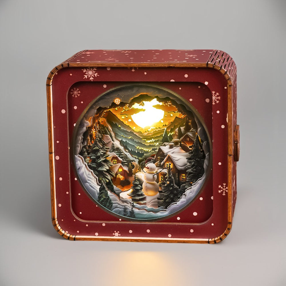 3D wooden puzzle night light featuring a snowy mountain scene with a snowman and glowing sunset effect.