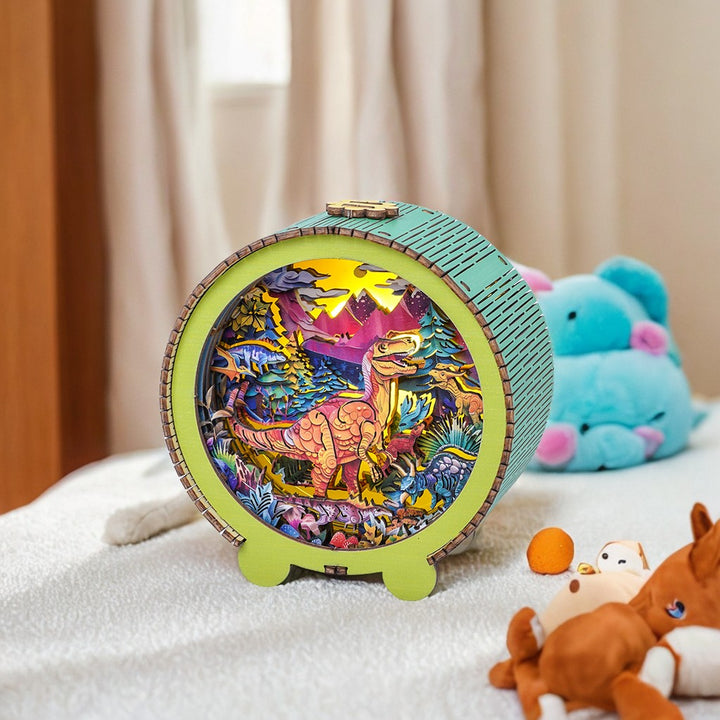 3D wooden dinosaur night light kit showcasing a vibrant dinosaur scene, perfect for children's rooms.