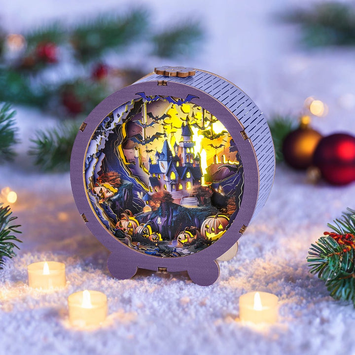 3D wooden puzzle night light featuring a spooky Halloween castle scene with pumpkins and trees, surrounded by festive decorations.