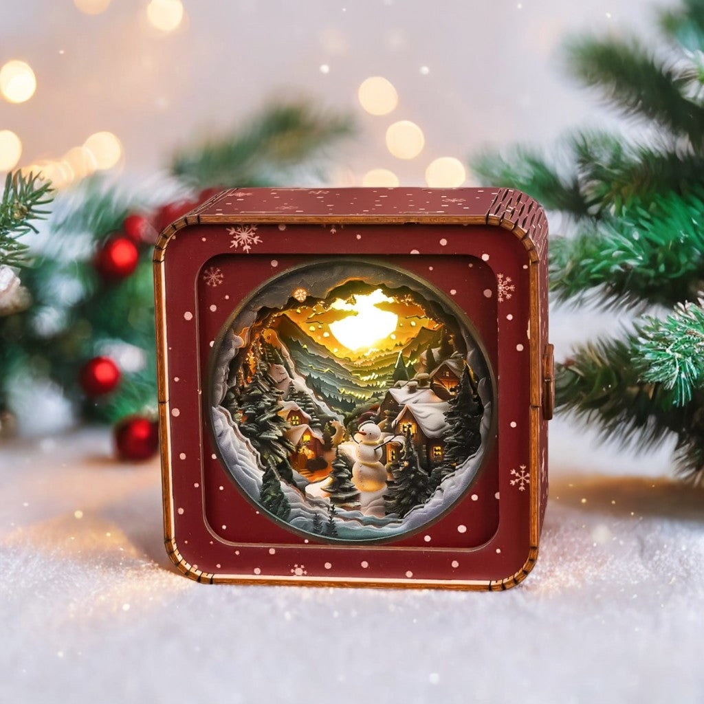 Snow Mountain Hut Kit 3D wooden puzzle night light with serene winter scene, glowing snowman, and cozy cabin ambiance.