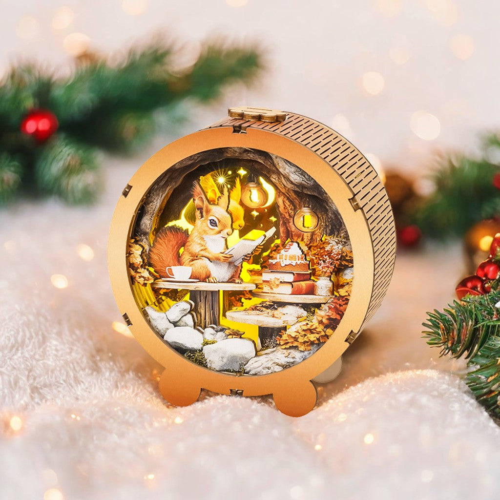 3D wooden puzzle night light featuring a squirrel reading in a cozy autumn setting with leaves and warm lights.