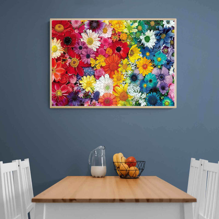 Colorful Flowers 500/1000 Piece Puzzle displayed on a wall in a cozy dining area.