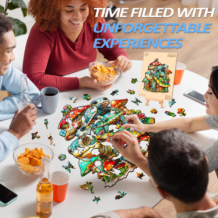 Group of friends enjoying the Turtle Family Wooden Jigsaw Puzzle together at a table with snacks and drinks.