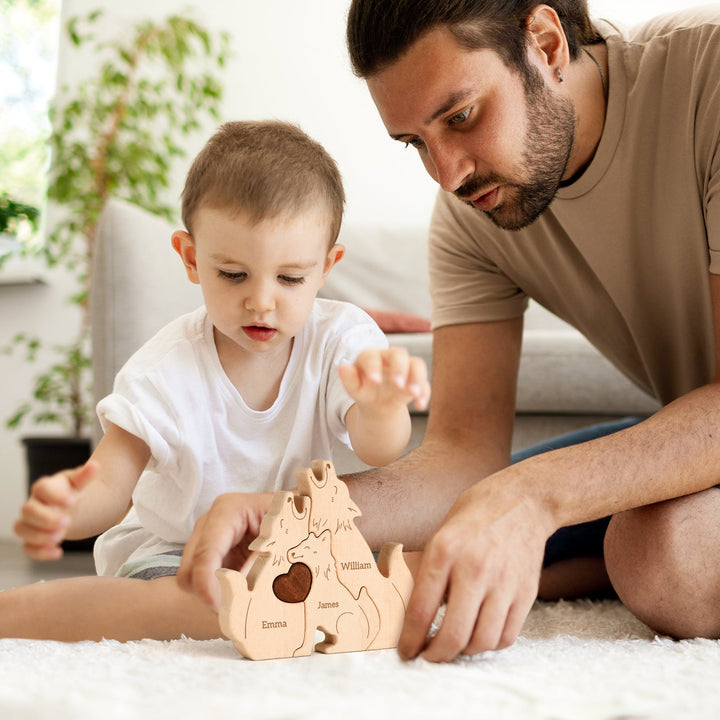 Father and son playing with a personalized wooden wolf family name puzzle, showcasing names and family bonding.