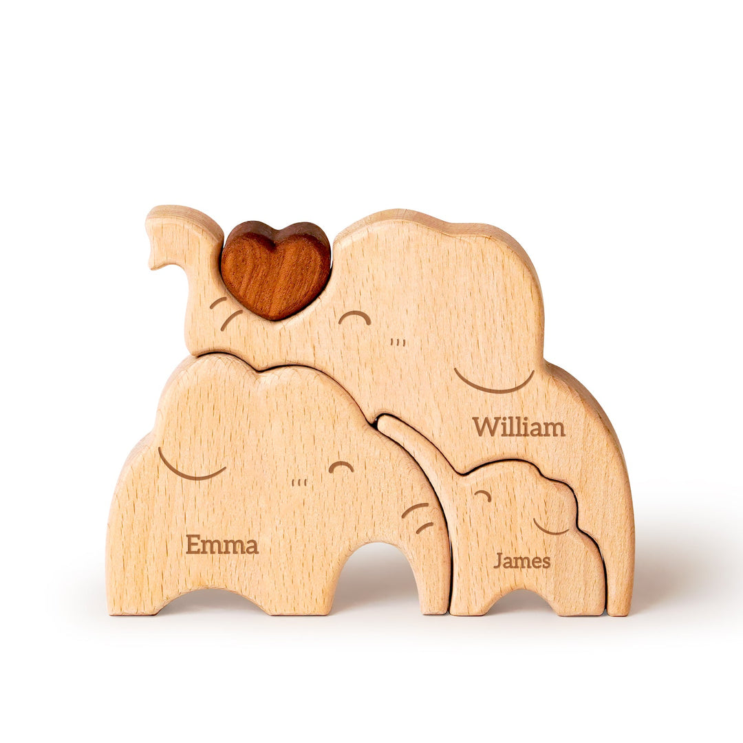 Personalized wooden elephant family puzzle with hearts and names: Emma, William, and James for family decor.