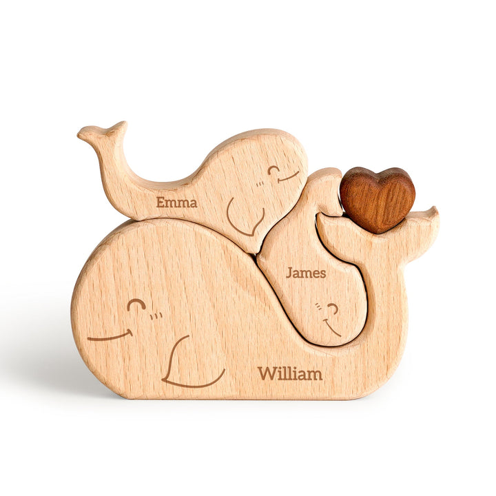 Customized wooden whale family name puzzle with carved names, perfect for family decor and gifts.