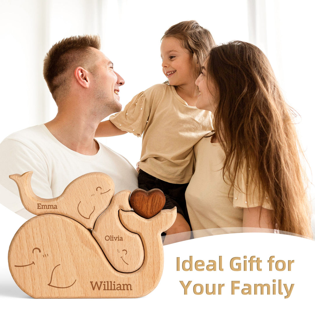Customized wooden whale family name puzzle, featuring names Emma, Olivia, and William, perfect for family gifts.