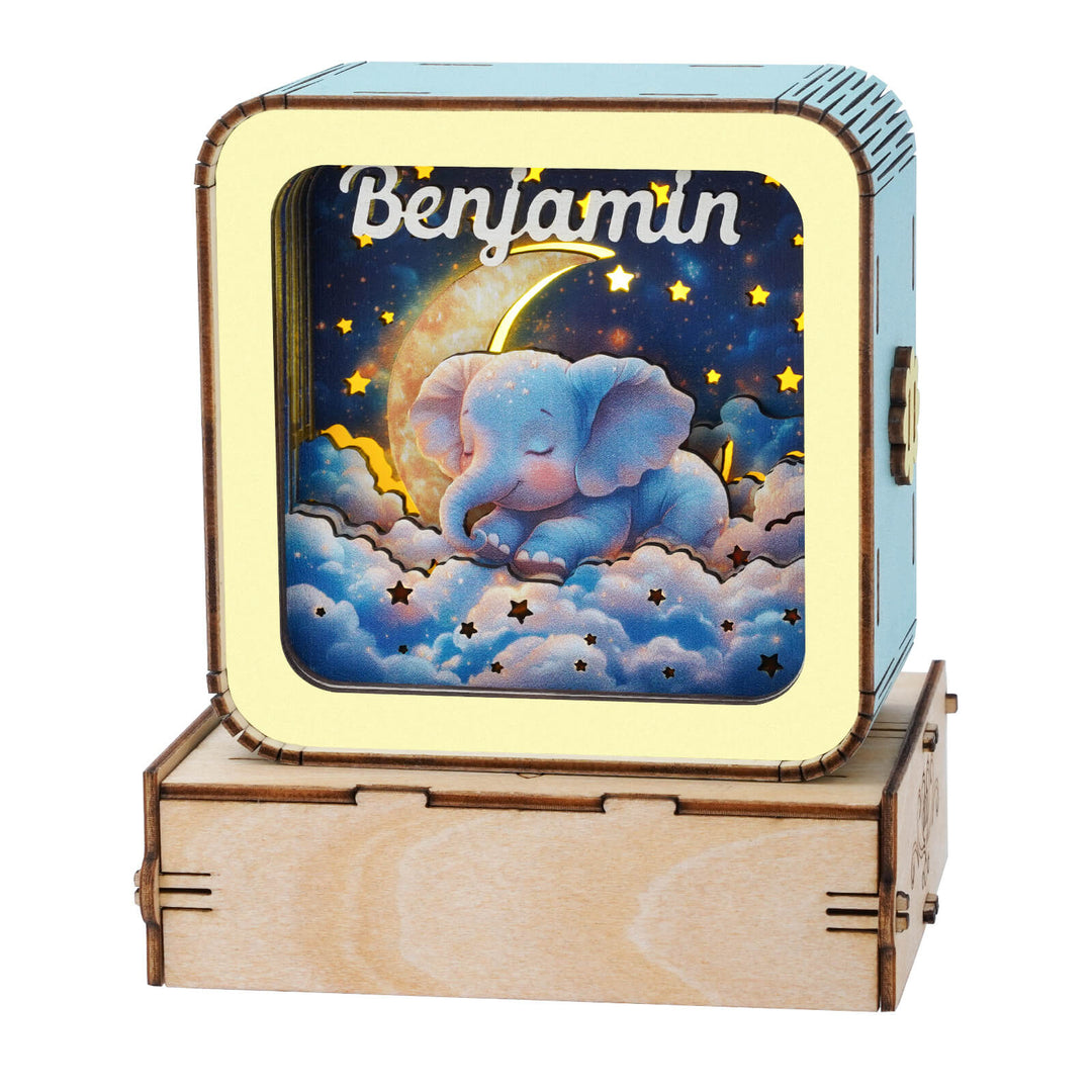 Personalized 3D wooden puzzle night light featuring a cute elephant and stars with the name Benjamin.