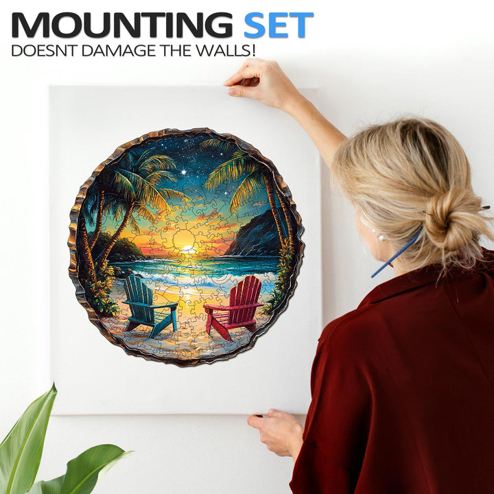 Woman assembling a colorful 3D Sunset Beach jigsaw puzzle mounted on wall, showcasing vibrant tropical scenery.