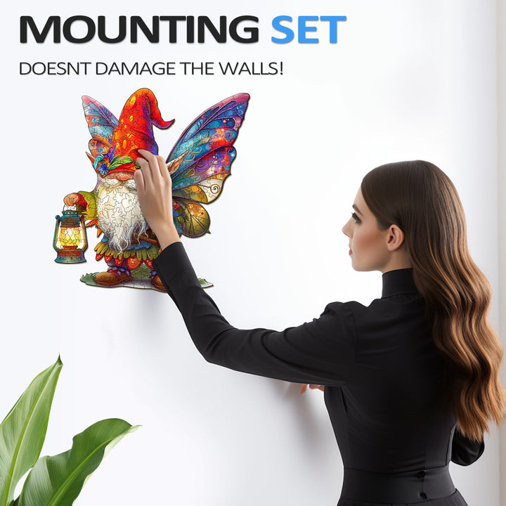 Person mounting a colorful gnome wall decor, showcasing the no-damage mounting set for easy home decoration.