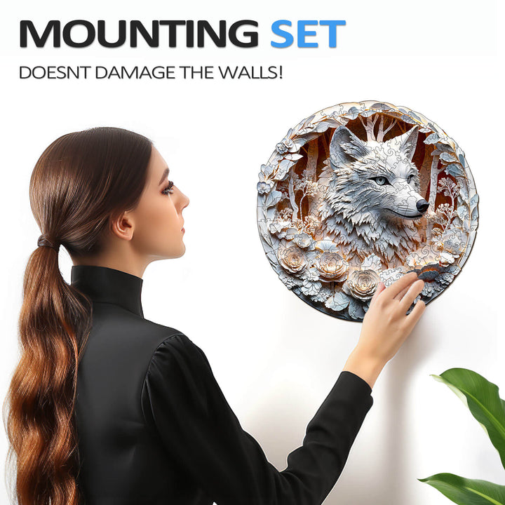 Woman mounting a 3D wooden wolf puzzle on a wall, showcasing its easy installation without damage.
