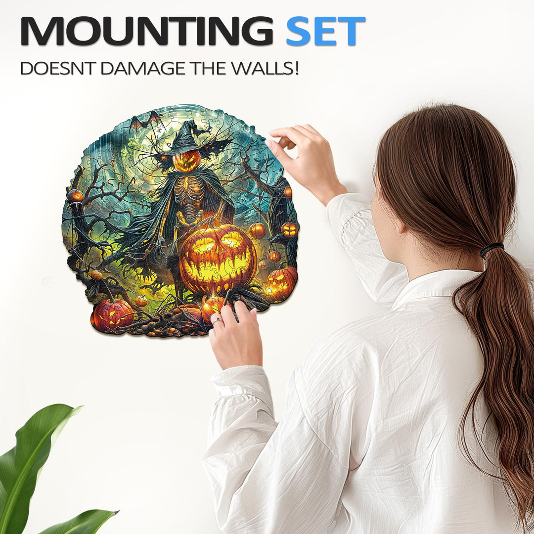 Woman installing a Halloween wooden jigsaw puzzle with a mounting set that doesn't damage walls.