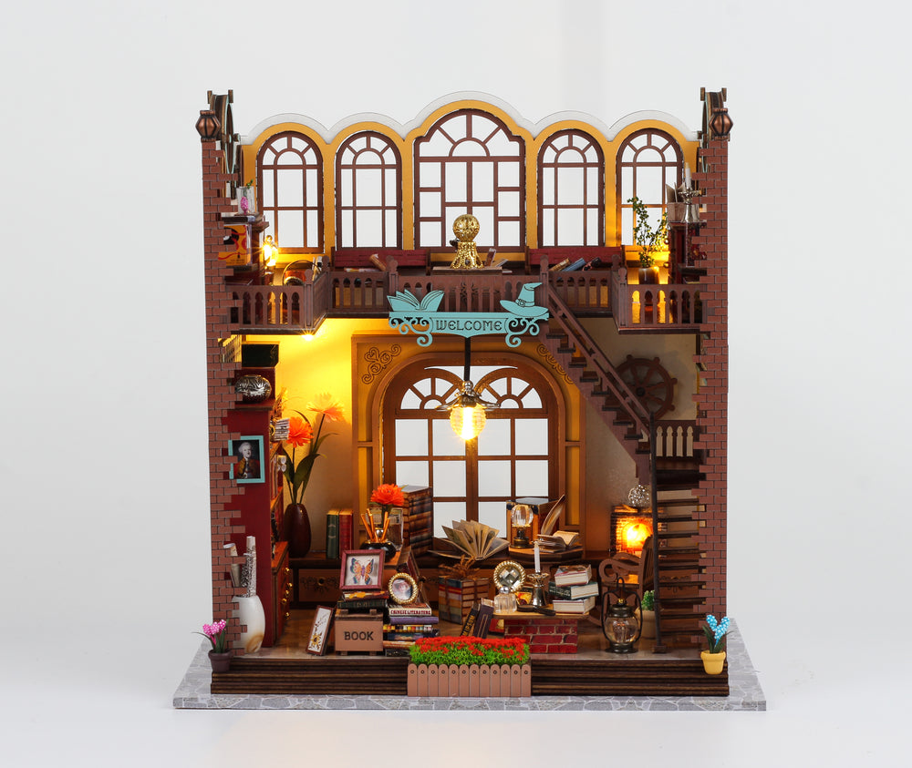 Magic Book Store DIY Book Nook Kit showcasing a cozy, illuminated wooden puzzle interior with musical decor.
