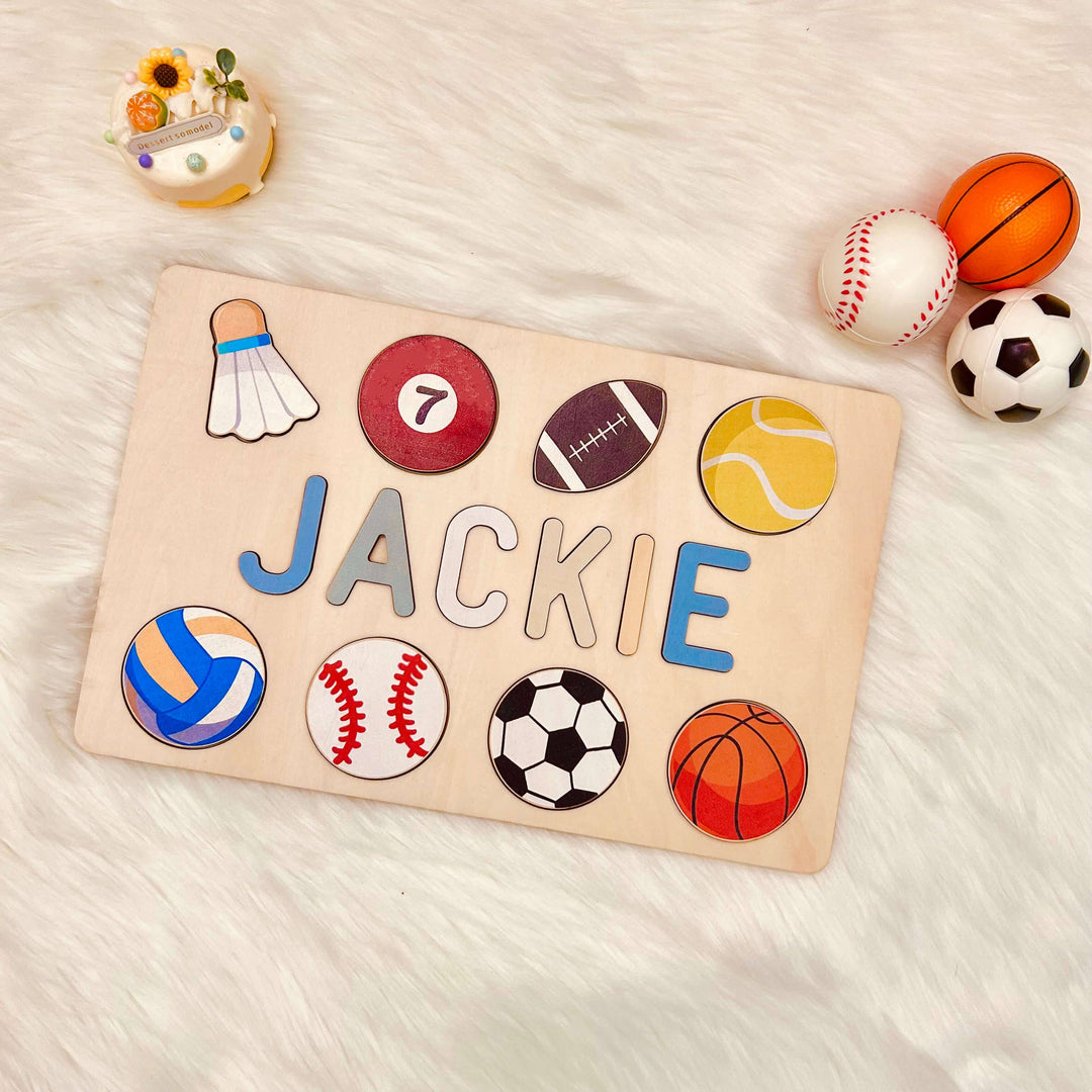 Personalized wooden baby name puzzle with sports balls, engraved with the name Jackie, eco-friendly plywood material.