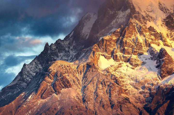 Stunning sunrise over snow-covered mountain peaks, perfect for the Snow Mountain of Sunrise puzzle.