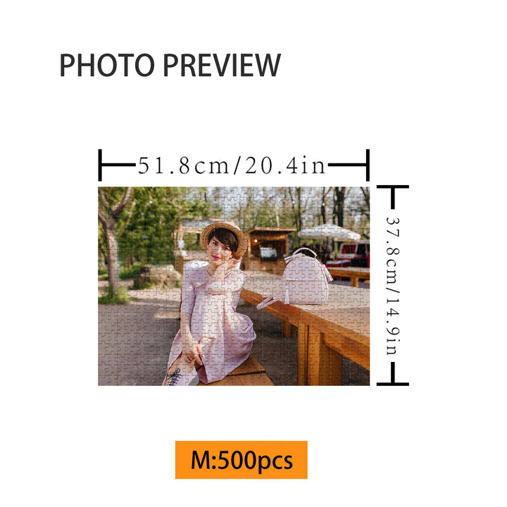 Photo preview of a 500-piece jigsaw puzzle featuring a woman sitting outdoors.