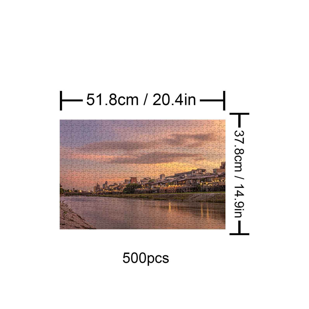 Sunset River City 500 piece jigsaw puzzle featuring a serene river view at dusk, enhancing focus and cognitive skills.