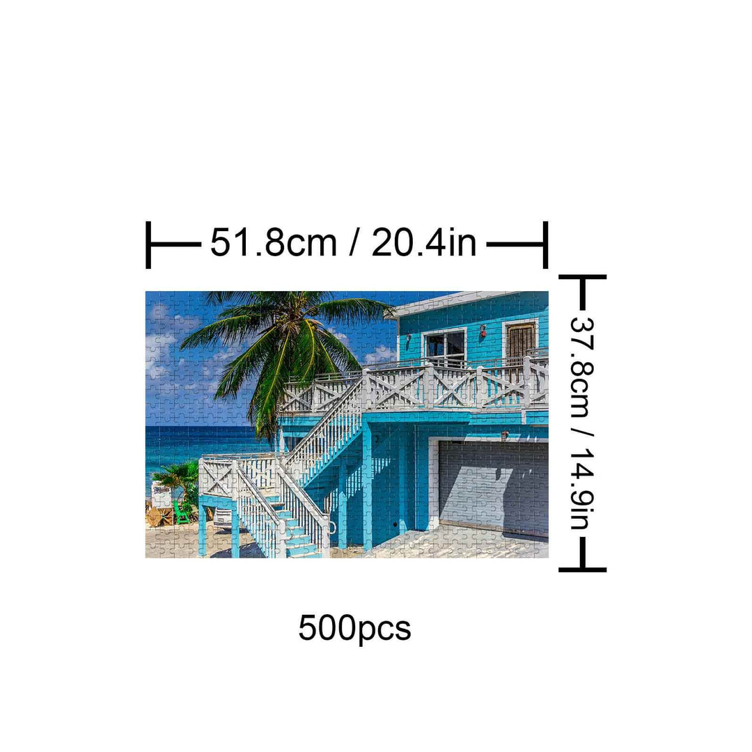 500-piece Summer Style puzzle featuring a blue beach house with palm trees and ocean view, perfect for puzzle enthusiasts.