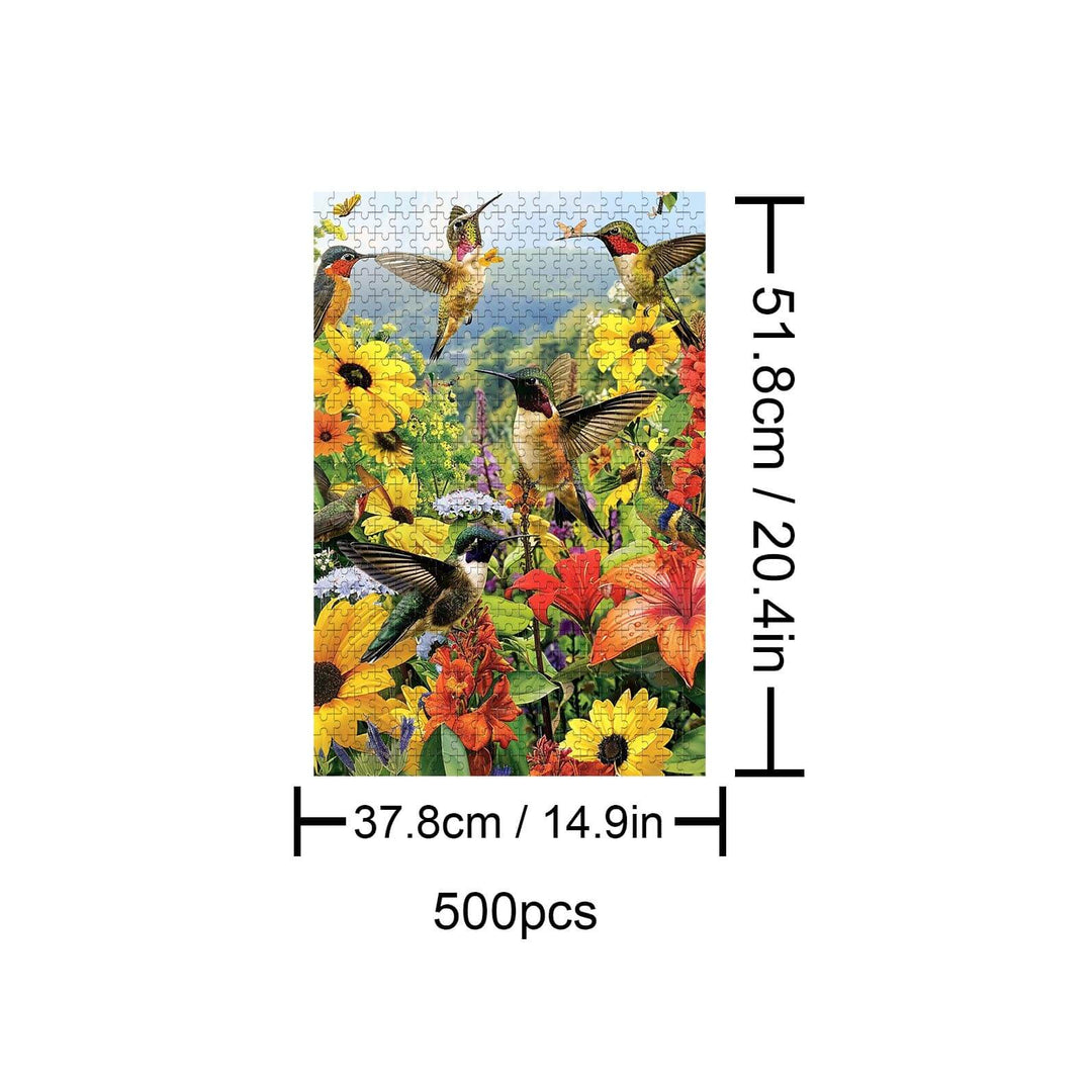 500-piece jigsaw puzzle featuring colorful hummingbirds and vibrant flowers in a nature scene.