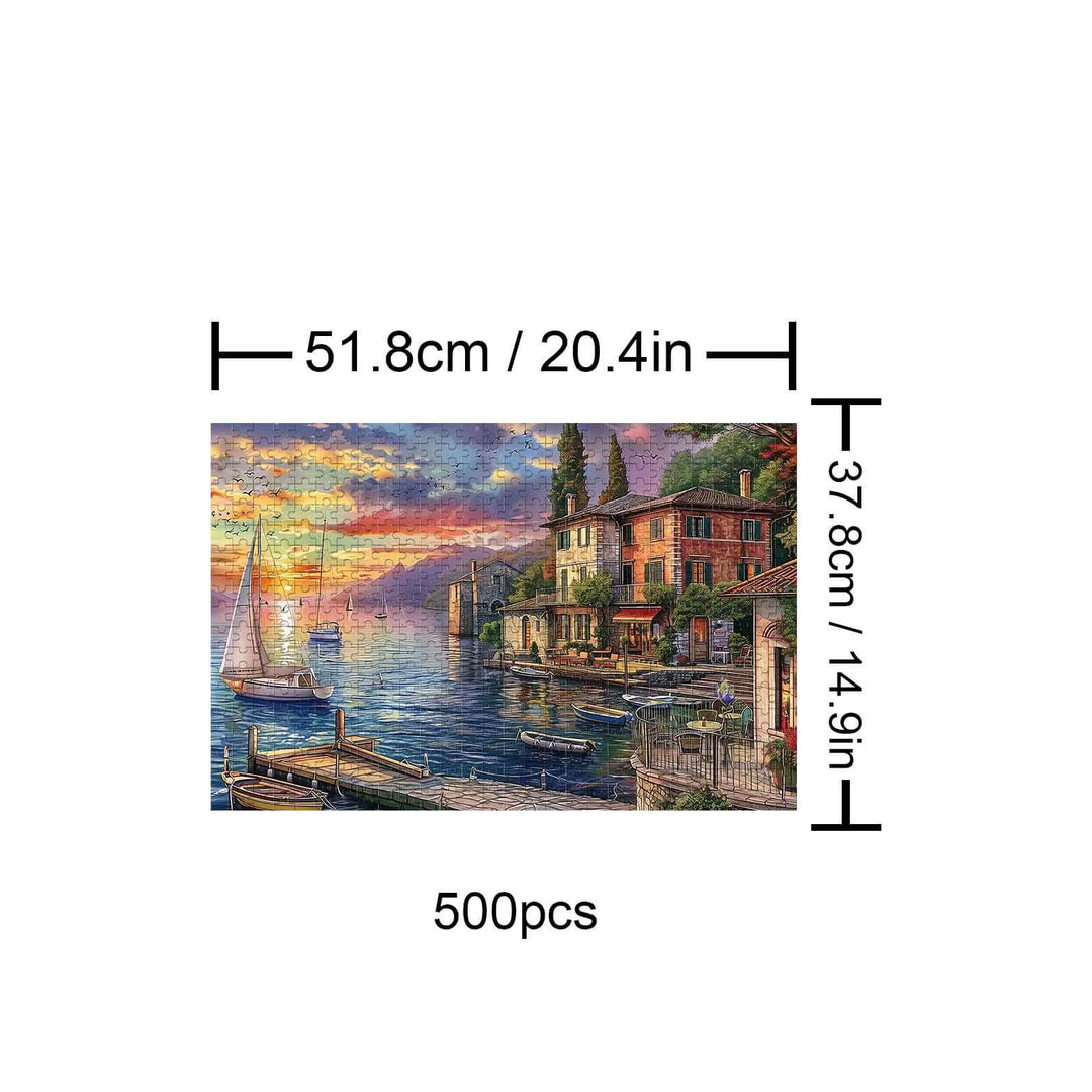 Golden Twilight Haven 500-piece jigsaw puzzle, featuring a serene sunset over a lake with boats and colorful buildings.